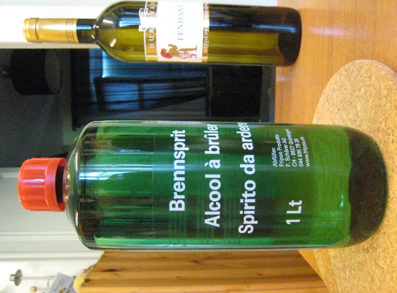 photo of bottle of burning alcohol